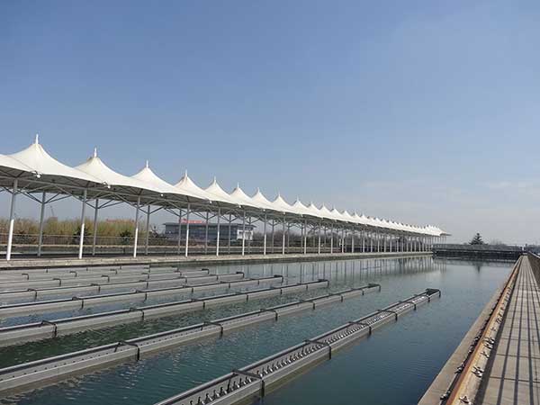 昆明玻纖基層PTFE膜結構生產揭秘：從原料采購到成品出廠的全流程